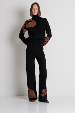 Calça palazzo de malha com modelagem ampla e estampa floral em jacquard. FRACOMINA 