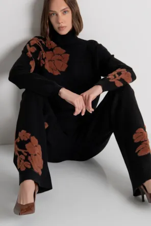 Calça palazzo de malha com modelagem ampla e estampa floral em jacquard. FRACOMINA 