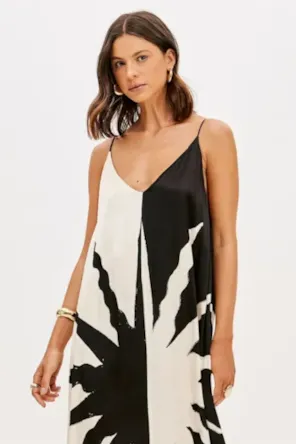 SAIA COMPRIDA ESTAMPA PRETA LANÇA PERFUME 